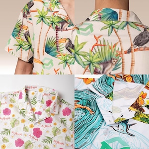 May include: A collection of short-sleeved shirts with tropical patterns. One shirt features a cream background with toucans, lemurs, and palm trees. Another has a white background with pink hibiscus flowers and the word "Aloha". The third shirt has a blue wave design.
