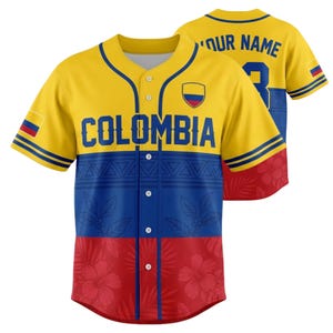 May include: A baseball jersey in the colours of the Colombian flag: yellow, blue, and red. The word "COLOMBIA" is across the chest. The jersey has a button-up front and a floral pattern. The back has the text "YOUR NAME" and the number 3.