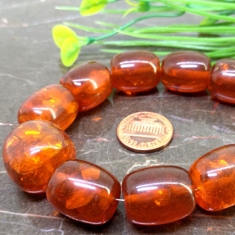 Natural Amber 12-20mm Smooth Barrel Gemstone Beads Approx 20 pieces on 12 Inch long strand JBC-ET-BAMB001