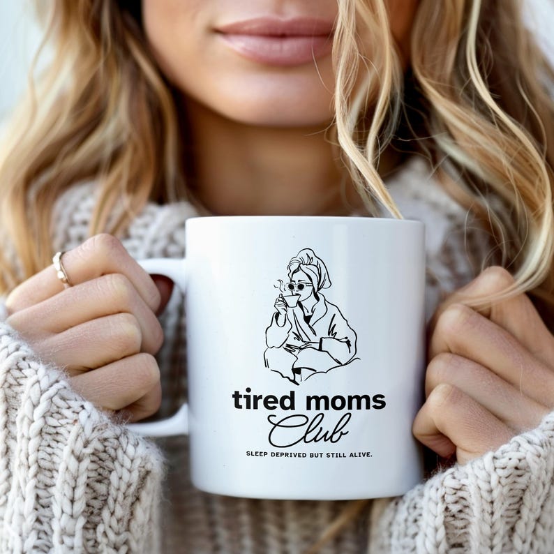 May include: A set of three ceramic mugs with a speckled, matte finish in grey, white, and black. Each mug has a simple, minimalist design, suitable for coffee or tea.