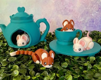 Ratos impressos em 3D, articulados e flexíveis, com camadas de fidget em verde para alívio da ansiedade
