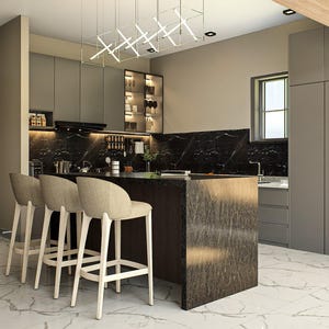 May include: Modern kitchen interior with a dark marble countertop and island. Features include light-colored bar stools, gray cabinets, and a wooden door. The floor is white marble, and the lighting is contemporary.