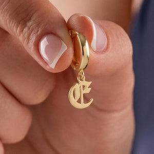 May include: A set of three ceramic mugs with a speckled, matte finish in cream, light grey, and dark grey. Each mug has a simple, modern design and a rounded handle. Suitable for coffee, tea, or other beverages.