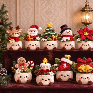 May include: A collection of nine crocheted Christmas-themed figurines, each seated in a small cream-colored pot with a smiling face. The figures include a reindeer, Santa Claus, a Christmas tree, a snowman, a poinsettia, a gingerbread man, a candle, a stocking, and golden bells.