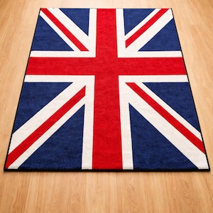 Könnte beinhalten: Rechteckiger Teppich mit der Flagge des Vereinigten Königreichs, dem Union Jack. Der Teppich hat einen marineblauen Hintergrund mit einem roten Kreuz und diagonalen Streifen in Weiß und Rot. Mit schwarzem Rand.