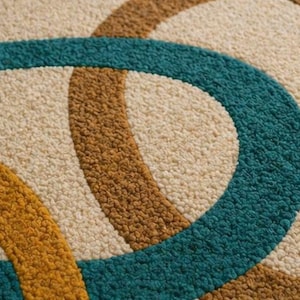 Alfombra de lana de lujo tejida a mano, alfombra con diseño abstracto de anillos entrelazados, alfombra minimalista moderna, alfombra con patrón geométrico de bucles.