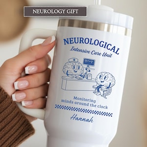 May include: White travel mug with a handle, featuring blue text and illustrations. The mug reads "NEUROLOGICAL Intensive Care Unit" with cartoon brains. The text "Monitoring minds around the clock" and a name are also included.