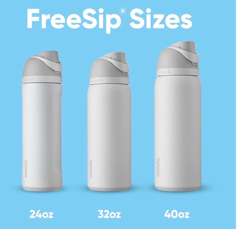 May include: Three white Owala FreeSip water bottles of varying sizes are displayed against a light blue background. The bottles have gray lids and are labeled 24oz, 32oz, and 40oz. The text "FreeSip Sizes" is at the top.