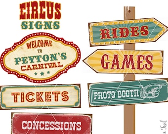 May include: A set of vintage-style circus signs with red, yellow, and blue colors. The signs are made of wood and have a distressed look. The signs include the words "Rides", "Games", "Tickets", "Concessions", "Prizes", and "Photo Booth".