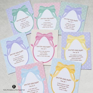 May include: Eight Easter Egg Hunt clue cards with pastel backgrounds and polka dots. Each card has a decorative egg shape with a bow. The cards feature different coloured bows and include clues for an Easter egg hunt, perfect for children.