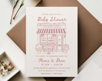 May include: A pink and white baby shower invitation with a hand-drawn illustration of a bakery storefront. The text reads "Please join us for a Baby Shower Patisserie Olivia" and includes the date, time, address, RSVP information, and registries.