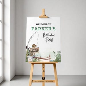 May include: A white sign on a wooden easel with the text "WELCOME TO PARKER'S Birthday Party!" in green and black. The sign features a fishing-themed illustration with a fishing rod, a boat, and the words "GONE FISHING".