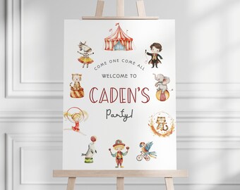 May include: A white sign with a red and white circus tent, animals, and performers. The sign says "Come one come all welcome to Caden's Party!"