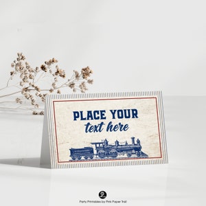May include: A printable place card featuring a vintage blue and white train engine on a red and white striped background. The text "PLACE YOUR text here" is printed in blue.