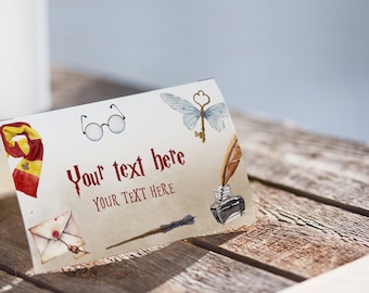 May include: A white card with a brown background and various illustrations, including a pair of glasses, a key with a butterfly, a quill pen, and an inkwell. The text "Your text here" and "YOUR TEXT HERE" is printed on the card.