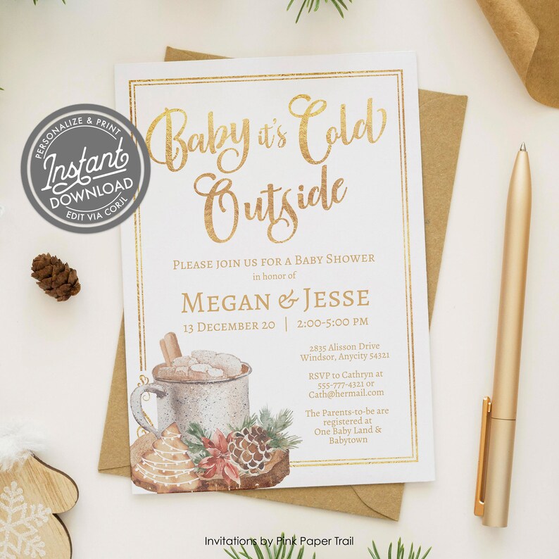 May include: A white rectangular baby shower invitation card with gold foil text reading Baby it's Cold Outside, Megan & Jesse, and event details. The design features a watercolor illustration of a mug, pinecone, and gingerbread cookie.