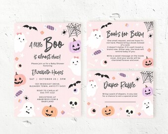 May include: Pink baby shower invitations with a Halloween theme. The invitations feature ghosts, pumpkins, bats, and spiderwebs. The text reads "A Little Boo is Almost Due!" and includes details for the event.