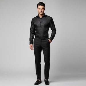 May include: A black long-sleeve button-down shirt with a subtle floral pattern, paired with black dress pants and black leather shoes. The outfit is a classic, formal ensemble.