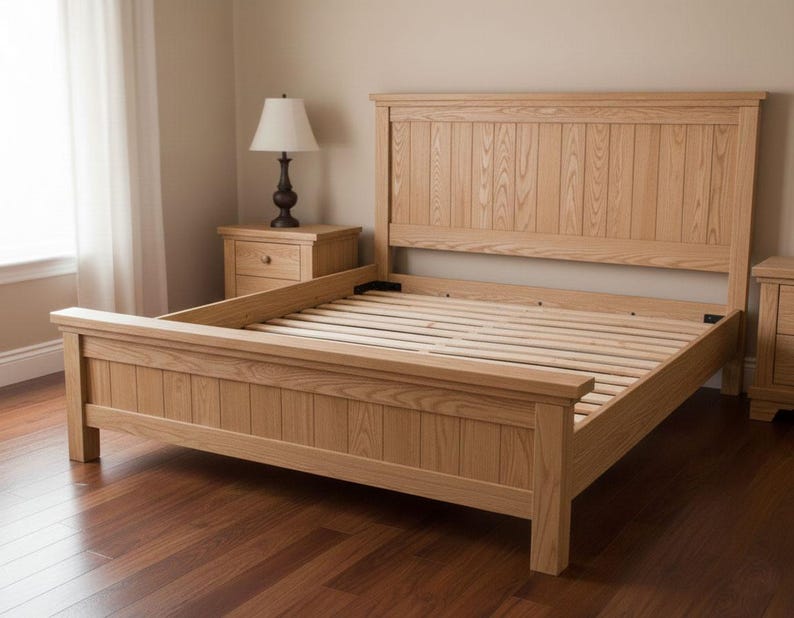 May include: A light-colored wooden bed frame with a headboard and footboard. The bed frame is made of vertical wooden planks and has a slatted base. The bed frame is approximately 80 inches long.