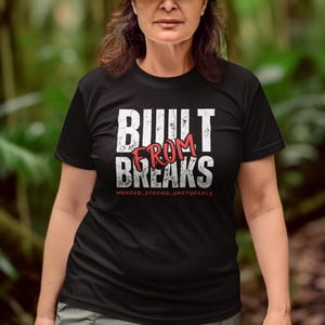 Empowering Strength Unisex Tee - Built From Breaks, Resilience Shirt, Inspirational T-Shirt, Motivational Graphic Tee, Positive Vibes Top