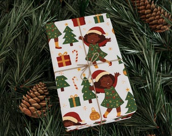 May include: Wrapped gift with a festive Christmas design. The wrapping paper features a repeating pattern of a girl in a Santa hat, Christmas trees, gifts, and candy canes. The gift is tied with twine and set against a backdrop of pine needles and pine cones.