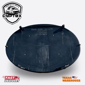 May include: A black car part with the text "TOYOTA" and part numbers. The part is oval-shaped with several mounting tabs. The image also includes the "CYPTEX" logo and "FAST DELIVERY" text.