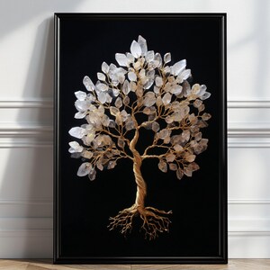 May include: Framed artwork showing a tree sculpture crafted from gold-coloured wire and clear crystals. The tree has a twisted trunk, branches, and crystal leaves, set against a black backdrop. The frame is black.