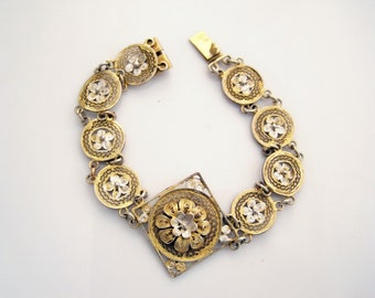 Vintage Silver Filigree Bracelet with a Flower Motif