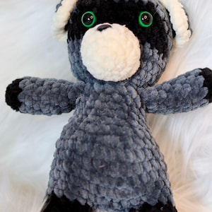 crocheted cuddly toy raccoon