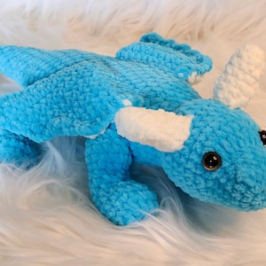crocheted cuddly toy dragon