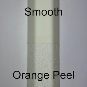 May include: A vertical image demonstrating two surface textures. The upper section is smooth and a pale cream colour, the lower section has an orange peel texture in a similar shade. The words "Smooth" and "Orange Peel" are displayed above and below the textures.