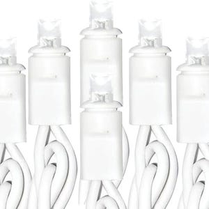 May include: A string of white LED light bulbs with clear, faceted lenses and white plastic bases. The bulbs are connected by a thick white electrical cord, arranged in a vertical cluster against a plain white background to show the design.