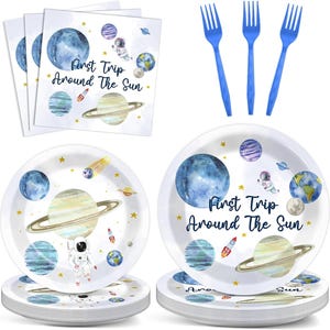 May include: A set of space-themed party supplies, including plates, napkins, and blue forks. The plates and napkins feature watercolor illustrations of planets, rockets, and an astronaut, with the text "First Trip Around The Sun."