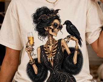 グラムスケルトンシャツ、シャンパンハロウィンTシャツ、スケルトンウーマンTシャツ、ガールズナイトハロウィンシャツ、スプーキーグラムTシャツ、レイヴンハロウィンギフトTシャツ