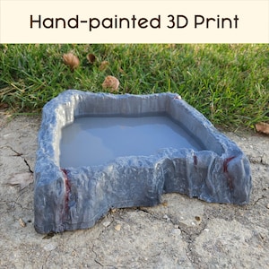 Cuenco de agua de roca dentada