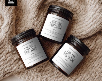 May include: Three brown glass jars with black lids and white labels, arranged on a beige knitted surface. The labels read "FOR ANY LABEL SIZE AND SHAPE" and "250g". The jars are from "1001MOCKUPS & CO".