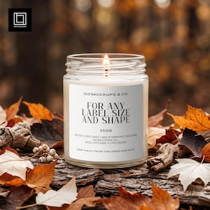 May include: A lit candle in a clear glass jar with a white label. The label reads "FOR ANY LABEL SIZE AND SHAPE" and "250g". The candle sits on a bed of autumn leaves and wood.