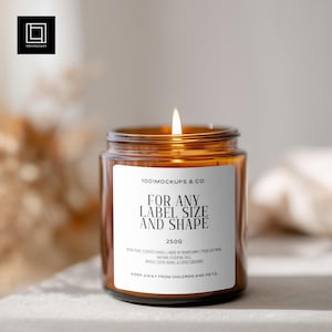 May include: A lit amber glass candle jar with a white label that reads "FOR ANY LABEL SIZE AND SHAPE". The candle is 250g and made with natural essential oils and whole coffee beans. The candle is non-toxic and made in Templeway.