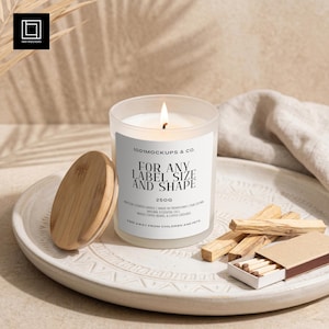 May include: A burning candle in a frosted glass jar with a wooden lid, on a white plate. The label says "FOR ANY LABEL SIZE AND SHAPE". Next to it are wooden sticks and a matchbox. The candle weighs 250g.