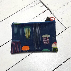 one of a kind / jellyfish / pouch / bag / travel bag  / cosmetic bag / chargers / cord carrier /  pleather / zipper pouch / cosmetic case