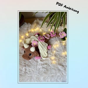 May include: A set of three ceramic mugs with a speckled, matte finish. The mugs are in shades of cream, light gray, and dark gray. Each mug has a simple, minimalist design and a rounded handle.