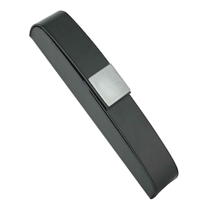May include: A black rectangular eyeglasses case with a silver-colored metal clasp. The case is made of a smooth, matte material and has rounded edges. The clasp is a small, square shape.