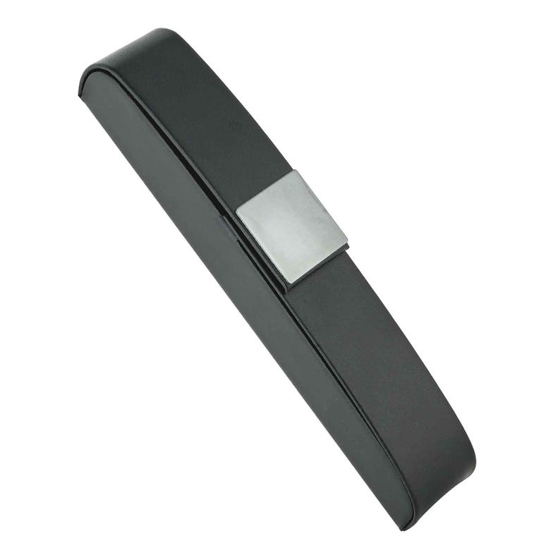 May include: A black rectangular eyeglasses case with a silver-colored metal clasp. The case is made of a smooth, matte material and has rounded edges. The clasp is a small, square shape.