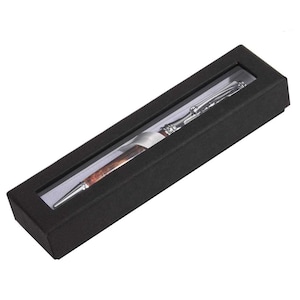 May include: A silver and wood-tone pen displayed in a black presentation box with a clear window. The pen has a silver tip and accents, with a wood-grain barrel and a white band. The box is rectangular and has a matte finish.