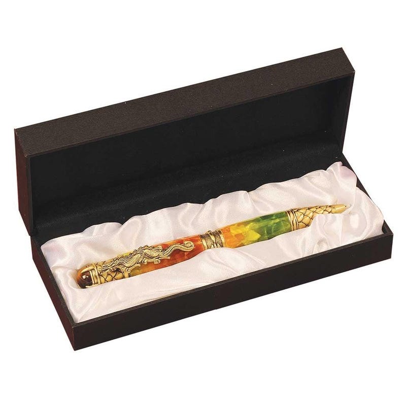 May include: A decorative pen with a colorful, marbled barrel in a black presentation box. The pen features gold-colored metal accents and a dragon design. The pen rests on a white satin-like fabric.