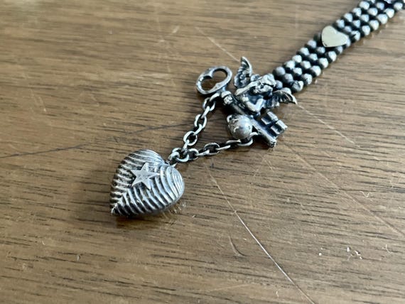 Antique 1920s Art Deco Cupid Opening Puffy Heart Watch Fob in German Silver