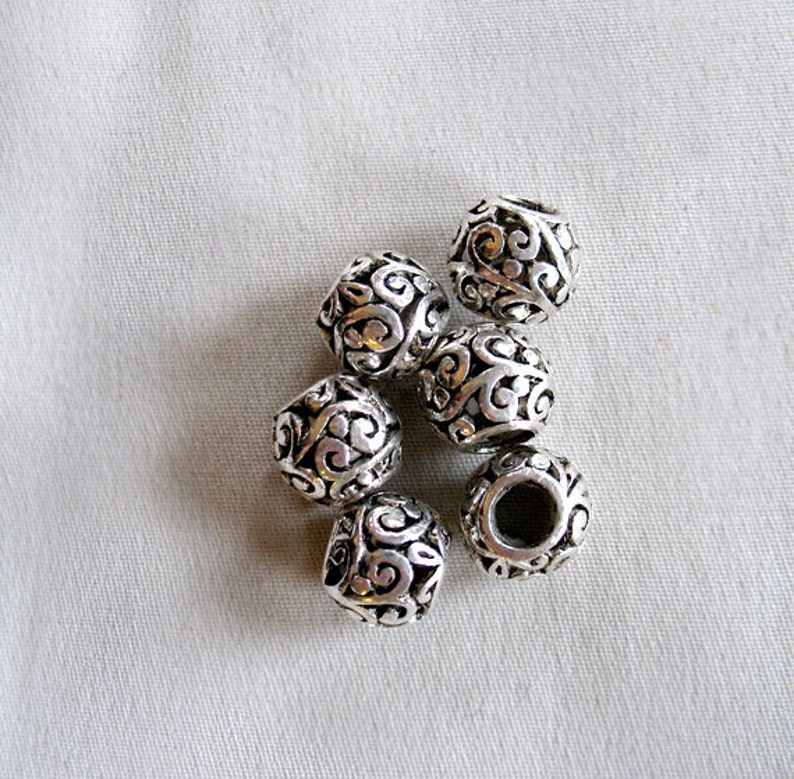 11mm wide x 9mm hole diameter 5mm package of 6 6 Silver scroll pattern with Black Antiquing large hole beads