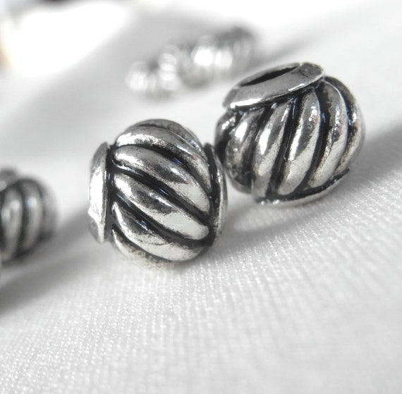 10 pc. Silver corrugated swirl pattern large hole beads with Black Antiquing, 10mm x 9mm, hole diameter 4mm, package of 10
