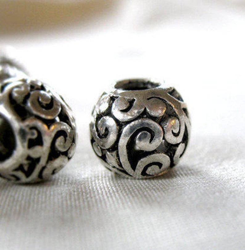 11mm wide x 9mm hole diameter 5mm package of 6 6 Silver scroll pattern with Black Antiquing large hole beads