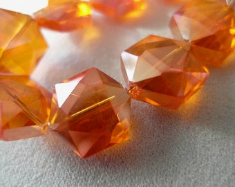 12pc, 16mm Orange Crystal Hexagon beads with pink rainbow finish, 16mm diameter x 10mm thick, 12 pieces, 7.5" strand